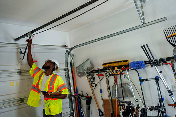 Professional Garage Door Panel Replacement technician working in McAlmont, AR